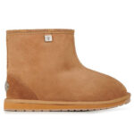 Gold brown, medium low sheepskin boot with gentle bridge curve, rubber sole and reinforced heel cup.