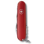 Classic Victorinox swiss army knife, folded up, with red plastic handle and carrying ring.