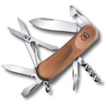 Swiss army knife with scissors, file, can- and bottle opener, corkscrew, awl, carrying ring and the wooden handle.