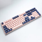 Keyboard with pink and blue keycaps