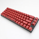 Keyboard with red keycaps and chinese syled print