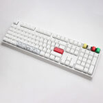 White keyboard with various keycaps in different colors