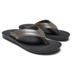 Men's flip flops with black soles and chocolate brown, stitched straps