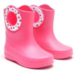 Pink children's rain boots with sticker around the carrying holes showing red lovehearts