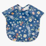 Blue bib decorated with beautiful drawings of wildflowers.