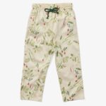 White kids' trousers with green drawstring, decorated with beautiful drawings of vegetables.