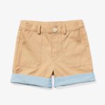 Beige kids' shorts with baby-blue inner lining, belt loops, a light-beige button and 2 front pockets.