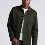 Man wearing dark green cotton overshirt.