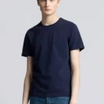 Young man wearing dark navy cotton t-shirt.