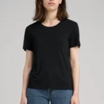 Young woman wearing black lyocell t-shirt.