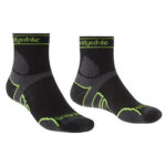 Black crew socks with green detailing.