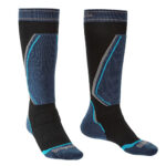 Black and dark blue overcalf ski socks with turquoise detailing.