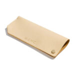 Beige leather eyewear case.