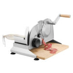 Manual food slicer slicing salami.