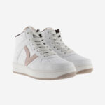 White women's sneaker-like ankle boots with pink detailing.