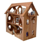 Three story wooden dollhouse.