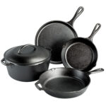 Set of cast iron skillets and pot.