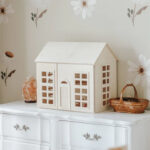 White wooden dollhouse.