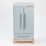 Blue wooden play fridge.